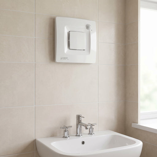 Aspiratore elicoidale da muro Soler & Palau Silent-Dual 100, installato a parete sopra il lavabo