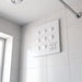 Aspiratore elicoidale da muro Vortice MFO 90/3,5 T con timer, installato a parete in bagno