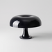 Lampada da Tavolo Artemide Nessino Nera vista tre quarti su fondo neutro