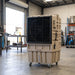 Raffrescatore Evaporativo Portatile Silenzioso KRS EVC125, in officina, vicino al portone aperto