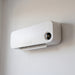 Termoventilatore Ceramico da Parete Olimpia Splendid Caldo Sky Wi-Fi Programmabile, di tre quarti sulla parete