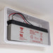 Batteria al Piombo Sigillata Yuasa NP 12V 2,3Ah, dentro una lampada di emergenza